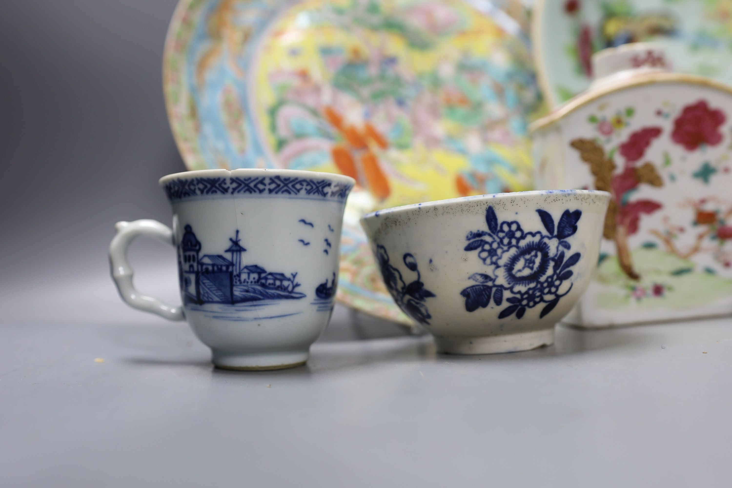 A Chinese celadon ground dish, another dish, Chinese export tea caddy, similar saucer and a blue and white teacup and saucer